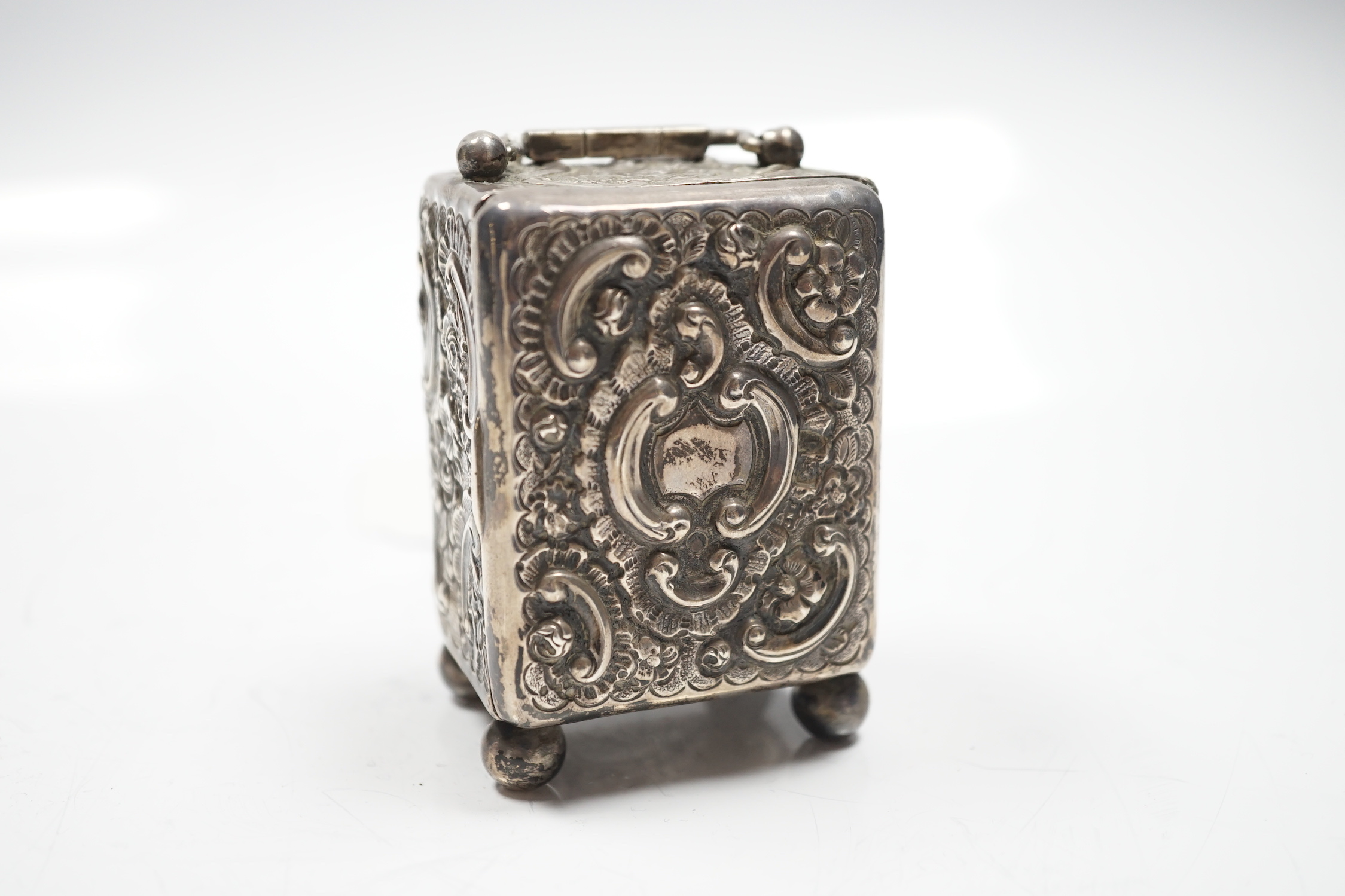 A late Victorian repousse silver cased carriage timepiece, John Newton Mappin, London, 1894, 79mm.